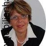 Frau Weckbach, Inhaberin des "Immobilienhauses Wiesbaden"
